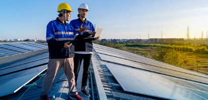 Cirion Technologies Sustainability workers solar panels desktop